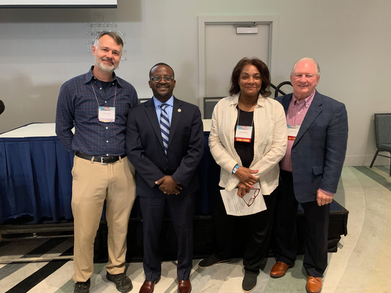 Alabama water resources conference. Dr. Mark Elliott (left), Daniel Blackman (second from the left), Sherry Bradley, and Lance LeFleur (right).